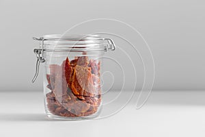 close up of jar with beef jerky or pastrami