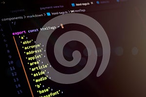Close-up of JavaScript code displaying an array of HTML tags, representing web development, markup language education, frontend