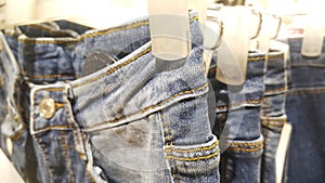 Close-up of jeans, display sales in shopping malls.