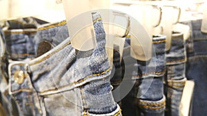 Close-up of jeans, display sales in shopping malls.