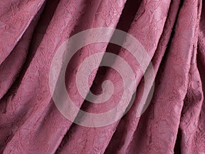 Close-up of jersey fabric textured cloth background. Close up on crumpled gray