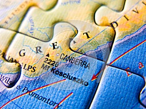 Close up of a jigsaw puzzle map depicting Canberra and Australia