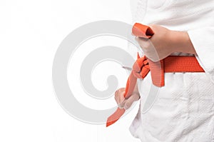 Close up of judo uniform, judo-gi, with belt isolated on white