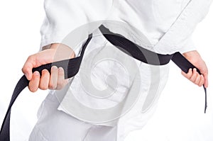 Close up of judo uniform, judo-gi, with belt isolated on white