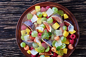 Close-up of juicy fruit salad with figs