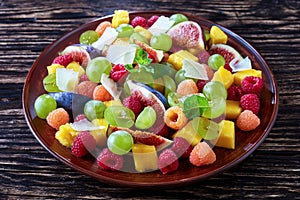 Close-up of juicy fruit salad with figs
