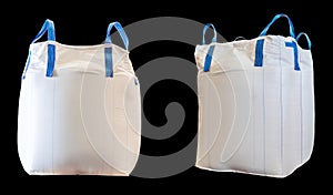 Close up of a jumbo bag on wooden pallet with background of bulk sugar bags