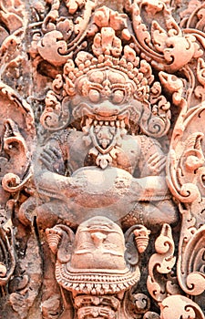 Close up of kamasutra like carvings or relief in the ancient temples of Angkor Wat, Siem Reap, Cambodia