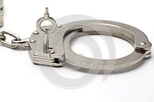 Close-up of key in handcuffs