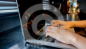 Close up of a keyboard computer with phone and tablet background