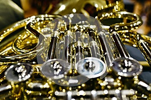 Close-up of the keys and valves of a French horn