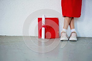 Close-up of Kindergartner`s Shoes Next to Diploma photo