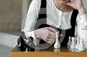 Close-up of king chess piece on a chess board.