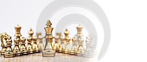 Close-up king chess stand with queen on chessboard concepts of leader teamwork volunteer challenge of business team or wining and