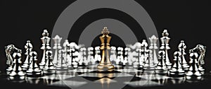 Close-up king chess standing on chessboard concepts of leader teamwork or volunteer or challenge of business team