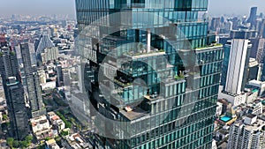 Close up of King Power Mahanakhon tower in Sathorn Silom central business district of Bangkok, Thailand