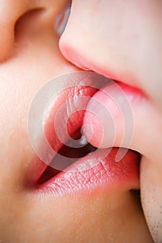 Close-up of kissing lips