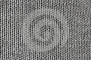 Close-up of knitted wool texture, background, gray