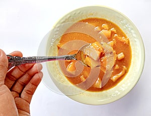 Close up of kolak sukun or bread fruit,  on white background photo