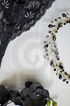 Close up lace lingerie on the white wooden background. Saxy black underwear. Fasion bra and women accessories