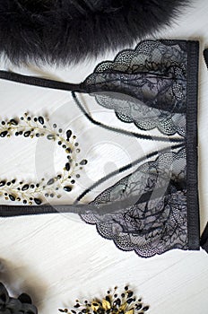 Close up lace lingerie on the white wooden background. Saxy black underwear. Fasion bra and women accessories
