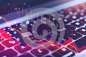 Close up of laptop with bank card and pink crisis business and forex chart on blurry background with bokeh circles. Downward trend