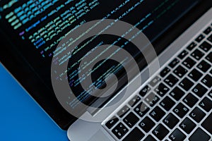 close up laptop computer screen with a programming code creating