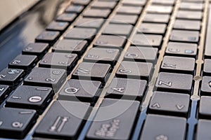 Close-up of laptop keyboard focus on button