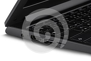 Close-up of laptop showing connecting port isolated on white background