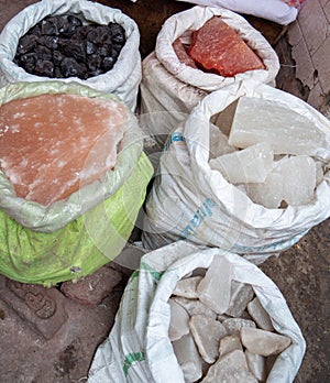 Close up of large bags of rock salt at the spice market of chandni chowk in old delhi