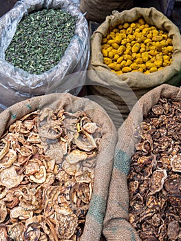 Close up of large bags of spices at the spice market of chandni chowk in old delhi