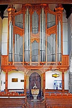 A close up of a large grand church organ pipes