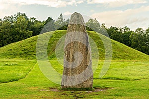 Close up of a large rune stone at an ancient burial ground