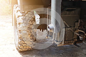 Close-up of a large wheeled vehicle undercarriage.