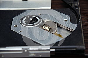 Close up of Laser head reader of CD DVD rom for desktop computer