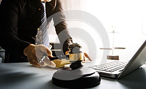 Close up lawyer businessman working or reading lawbook in office workplace for consultant lawyer concept