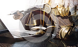 Close up lawyer businessman working or reading lawbook in office workplace for consultant lawyer concept