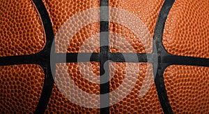 A close-up of a leather basketball on white