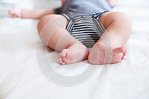 Close-up legs of a newborn baby