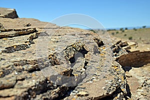 Close up of lichen covered layered stone