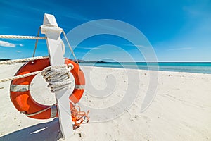 Close up of a life buoy in a tropical beach