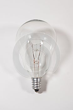 Close up of light bulb on a white background