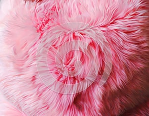 Close-up of light pink soft fur surface