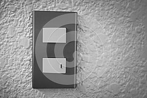 Close up of light switch with sunlight and shadow on white background, turn on and turn off, copy space,