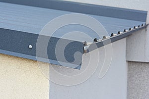 Close up on lightweight metal sheets roofing construction