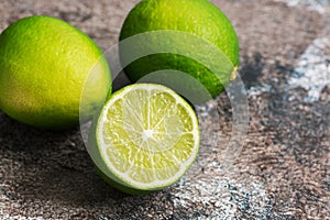 Close-up of lime on a rustic background. Selective focus.