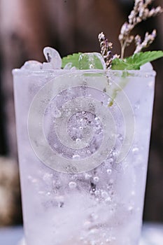 Close up Lime soda with mint leaves and flowers on the top