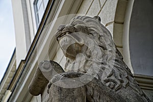 Close-up Lion statue sits majesticaly on it`s pedestal