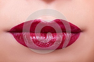 Close up lips with red lipstick