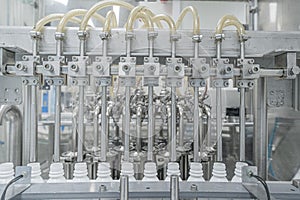 Close-up on liquid medicine production and focus on Pills During Enema Production and Packing Process on Modern Pharmaceutical